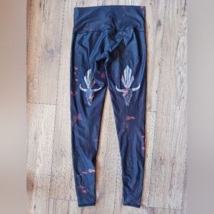 Teeki Black and Orange Leggings with Bull Skull Design